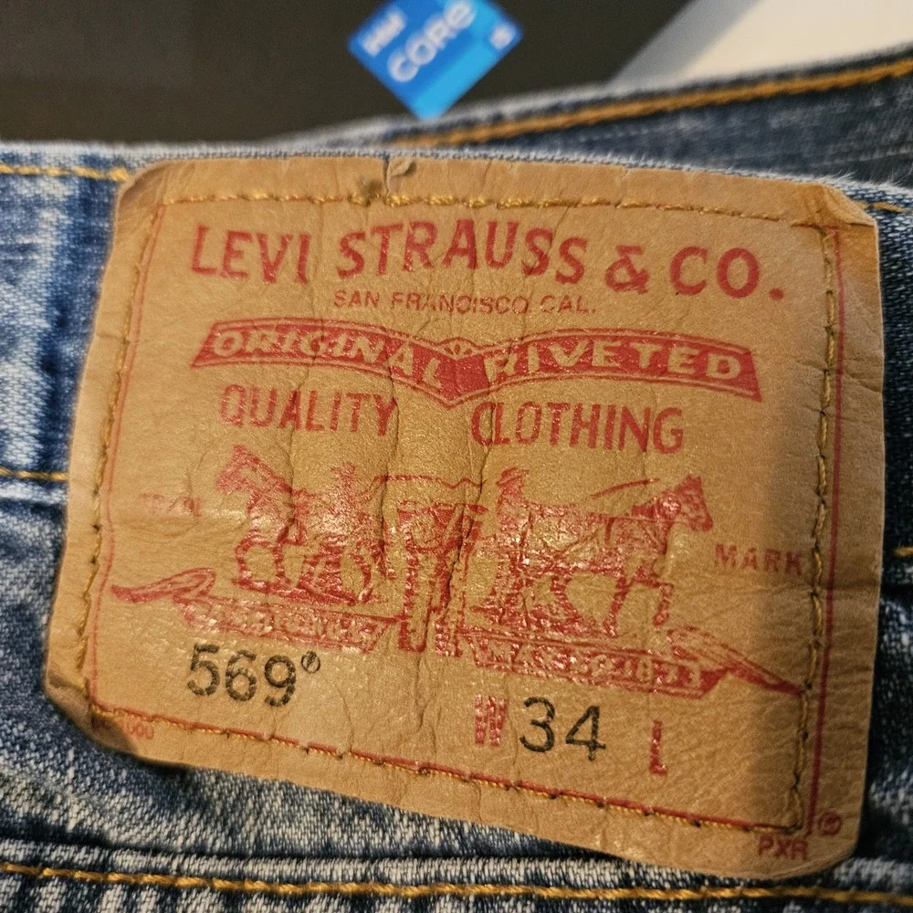 Levi's 569 Shorts Men’s Size 34 Blue Denim Holes fray fade Distressed Jorts